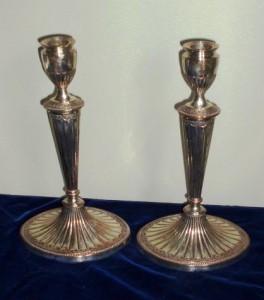 18th-century-sheffield-plate-candlesticks Pair of late 18th century Sheffield Plate Candlesticks engraved with a shaft of wheat and inscribed with the Latin words, “Sapiens Qui Assiduus,” which means “He who is wise is industrious.”