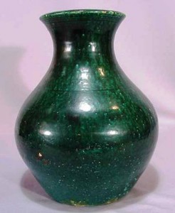 early-north-carolina-art-pottery This nice and early vessel, made by J.B. Cole, has a flaring form and is covered in a lead green glaze.