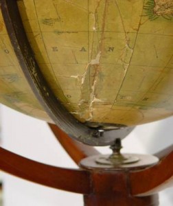 Saving Old Globes Paper panels that are fading and starting to peel can be cleaned and reattached to the shell.