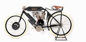 1907-indian-twin An example of an early Indian motorcycle. With a pedigree as a fine racing machine, Indian sales skyrocketed in the first two decades of the 20th century.