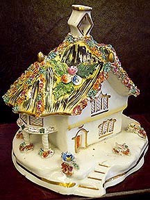 pastille-burner-iv A 19th-century English Staffordshire pastille burner in the shape of a thatched-roof cottage with, circa 1850.