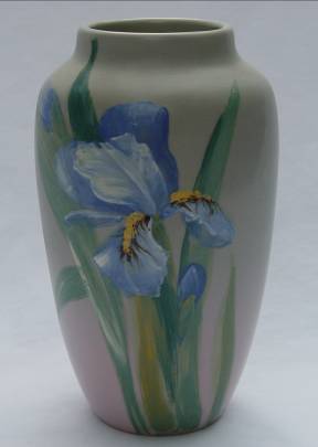 image0018.jpg Chips on the top rim of this Weller Art Pottery vase were professionally and invisibly restored by Old World Restorations, Inc., Cincinnati, Ohio.