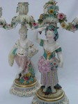 image008.jpg Pair of early porcelain candlesticks with old discolored repairs, small chips and missing leaves. This damage is difficult to see on a photo posted on an Internet listing.