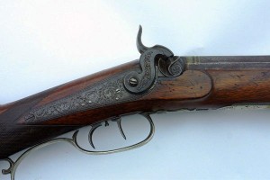 kentucky-style-american-rifle-i A Kentucky style American rifle by Blunt & Syms of New York. It features a .44 caliber 38-inch octagonal barrel and a back action lock with a double set trigger.