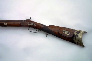 kentucky-style-american-rifle-iii The rifle is half stocked in walnut with high quality German silver mounts which are engraved with foliage, pheasants and deer.