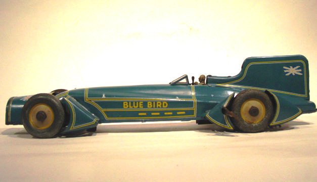 Guntherman A German-made Guntherman "Blue Bird" Land Speed Car in good working order. This tin lithographed wind-up car is 20 inches long and features sporty Art Deco detailing. Circa 1930.