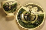 Mt. Washington Cog Railway A souvenir teacup & saucer depicting the Mt. Washington Cog Railway of New Hampshire. Multicolored transfer on both pieces, gold trim. Marked "Jonroth English Bone China.”