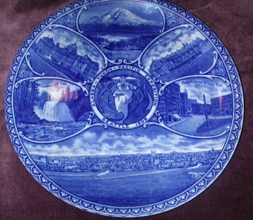 Rowland & Marsellus Alaska-Yukon-Pacific Exposition Plate An example of a Rowland & Marsellus Co. Alaska-Yukon-Pacific Exposition commemorative blue transferware plate, ca. 1909. The exposition was held in Seattle in 1909 and the face decoration depicts various Seattle and area landmarks.