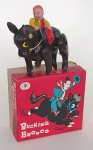 Wind-Up Celluloid Cowboy Doll Toy in Original Box This celluloid cowboy and horse, with its original box, is marked “Trade Mark Modern Toys” and “Made in Japan.” Circa 1940.