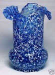 A cobalt blue glass celery vase with a tri-fold fluted ruffled edge, circa 1898-1906.