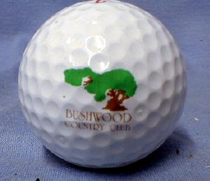 old-bushwood-country-club A golf ball with the Old Bushwood Country Club logo.