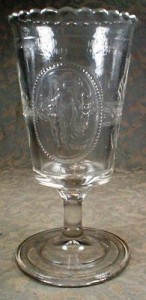 venus-cupid-celery-vase-minerva-eapg-antique An example of an early American Pattern Glass celery vase. This over-sized goblet with crimped lip, in the Venus & Cupid pattern, was produced by Richards & Hartley between 1875-1884 and by U.S. Glass after 1891.