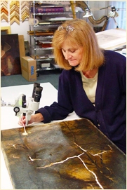 pp-47-paintings-restoration An oil painting undergoing restoration.