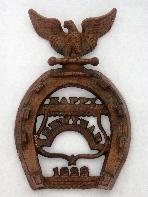 apict3285 A trivet wishing New Year’s blessing in 1888.