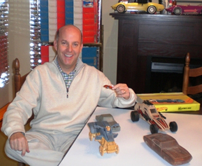 bruce-pascal Bruce Pascal poses with orange Ferrari P917 Hot Wheels and prototype Hot Wheel molds