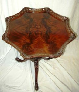 crotch One of the most distinctive wood patterns in all of furniture design is the book matched crotch cut veneer seen in the top of this Colonial Revival lamp table. Crotch cut veneer is cut from the intersection of a large branch with the trunk or the intersection of two large branches. That creates the "flame" or "feather" pattern seen in the veneer.