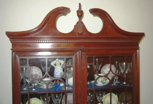 dentil Dentil – The square block molding near the top of this cabinet is called dentil molding.