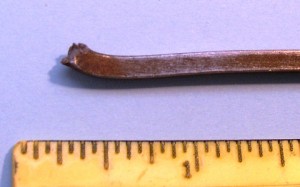 nail-stock This is a piece of 1/8-inch square rolled iron nail stock that was used by a “nailer” to hammer out a handmade nail.