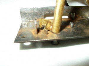 security This illustration shows how a notch key works over the internal security ring of a lock plate.