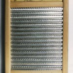 washboard Washboard: 18" tall Washboard with Victorian swimsuit advertising; value $65