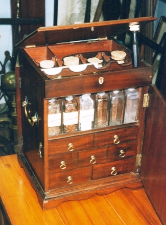 georgianchest2 Georgian apothecary chest, made by a British cabinetmaker of mahogany, is filled with the tools of the doctor’s trade. It sold in 2003 for $3,500.