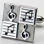 swank-musical-cuff-link Silvertone music theme cufflink set with a G clef and musical notes motif.