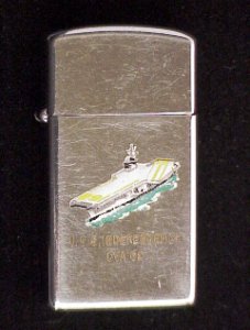 zippo-uss-independence A Vintage 1959 USS Independence (CVA 62) Town & Country Zippo Lighter. Zippo is Used with wear. Basically, common wear for a lightly used Zippo.