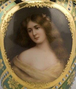 royal-vienna-style-porcelain-vase-close-up A close-up of the hand-painted portrait of a Victorian woman with rosy cheeks and flowing hair.