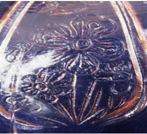 cherry-blossom-ii Two views of reproduction Cherry Blossom butter dish lid panel. The flowers look like a child’s drawing.