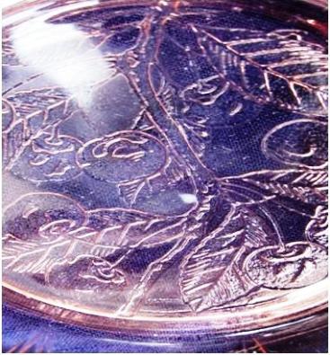 cherry-blossom-ix The leaves on a genuine Cherry Blossom butter dish base have an authentic look to them, with the cherries shaded for a realistic appearance. The pattern of the branches and cherries, as well as the tip of the leaves, extends to the edge of the base.
