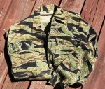goldtigershirt A “Golden tiger” camouflage shirt is one of the more uncommon collectible finds from the Vietnam War era.
