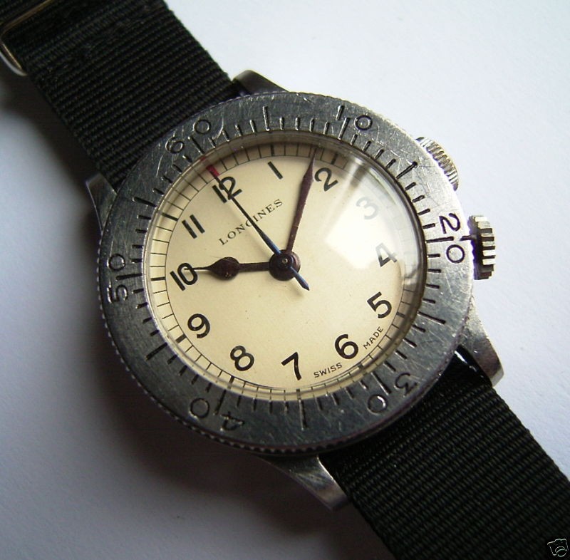 longines-wheems-raf2 This Longines World War Two Pilot's Wristwatch, with a Wheem's aircraft navigational calculation bezel, is an early and quite rare Longines Aircraft Navigation watch.