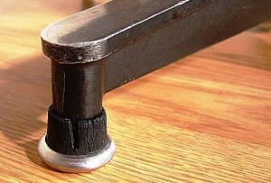 rubber-foot1 The earliest production chairs had push-on rubber “boot” glides on the feet of the ottoman.