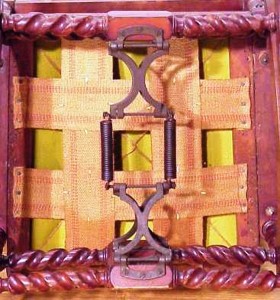 hunzinger-mechanism Hunzinger’s rocker mechanism used a series of metal brackets called a combination hinge attached to relatively thin, longer coil springs.