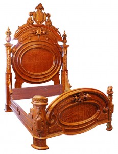 ren-rev A Renaissance Revival bed, circa 1875, reflects the architectural element of the style.