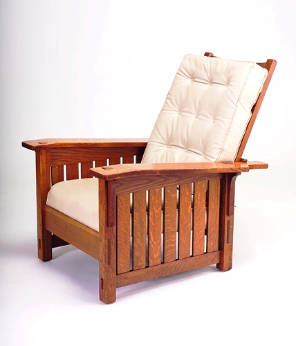 stickleyrecliner An original Gustave Stickley recliner. The seats have been recovered; originally they would have been dark brown/black.