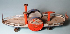 tin-steamboat A tin paddle-wheel steamboat.