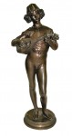 bronze-statue An artist-signed antique bronze statue of a figure playing a mandolin standing two feet tall sold for $1,980.