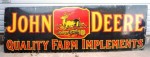 john-deere-porcelain-sign This John Deere Quality Farm Implements single-sided porcelain sign, measuring 3 feet by 5 feet, was purchased for $5,500.