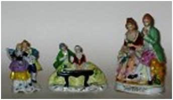 oj-fig-4 Three examples of paired porcelain figurines 3 ½” tall to 5 ¾” tall.