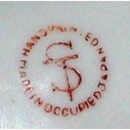 oj-fig-5b The maker's mark for Ardalt, the maker of the coach piece.