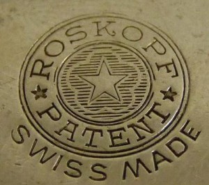 1896-expo-watch-3 The patent marking of a Georges Frederic Roskopf watch.