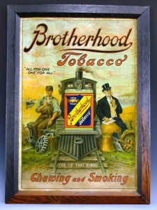 brotherhood-tobacco Many advertising signs, like this framed piece for Brotherhood Tobacco, dot the walls at Judy's D&G. All of this memorabilia will be auctioned off.