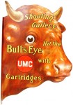 umc-tin-sign This UMC Shooting Gallery Bull’s Eye Cartridges lithographed tin sign, shaped like a bull’s head, sold for $4,068.