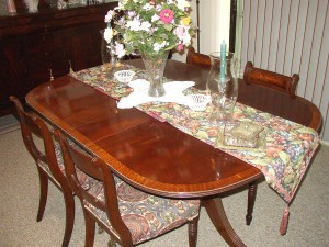 Center piece If left in place long enough, this table runner and center piece will protect the color of the table while the exposed sections fade around it. The table should be covered in the long term uniformly.