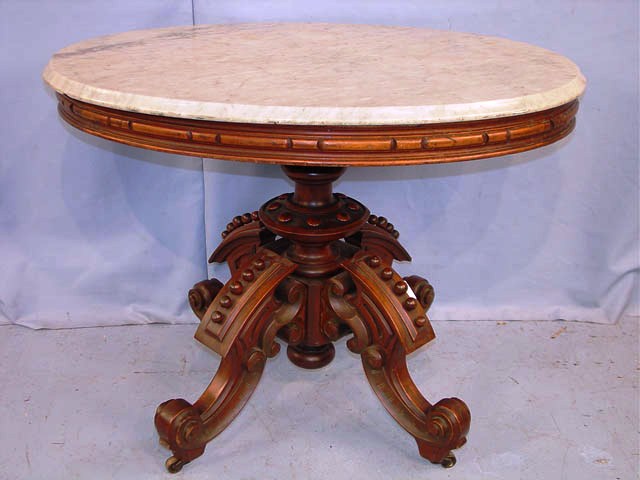 Parlor table Walnut Victorian marble-top parlor table attributed to Thomas Brooks (circa 1860) is one of the many items from Southern estates that will be up for sale on Oct. 17 and Oct. 31 by Stevens Auction Company.