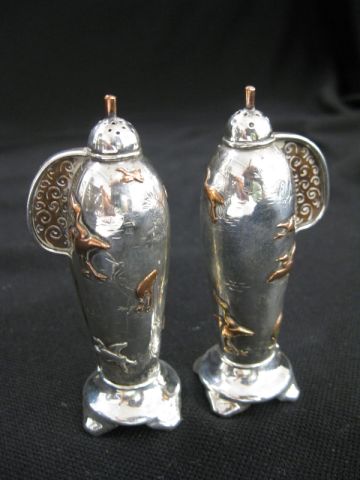 Salt and pepper This set of rare Tiffany sterling silver and mixed metals salt and pepper shakers went to a determined buyer from New York City for $4,000 at a multi-estate sale Sept. 25-26 hosted by Richard D. Hatch & Associates.