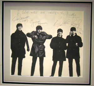 Beatles image Another item to garned a lot of interest is this large photo of the Beatles, signed by all four members and personalized to Liberace.