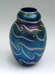 Lotton vase This beautiful Charles Lotton etched signed art glass vase, measuring 10 inches tall, signed and dated 2003, sold for $1,035.