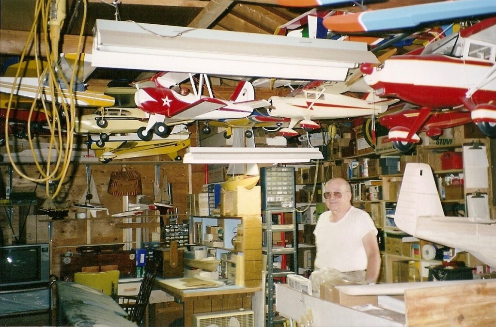 Paul with collection Paul Lachat of Winsted, Conn., stands among his massive collection of model planes and other items that will go on auction on Dec. 6, 2009. There are more than 600 completed planes (some made of pine and dating back to the World War II era) and about 500 more kits that he bought but never assembled.